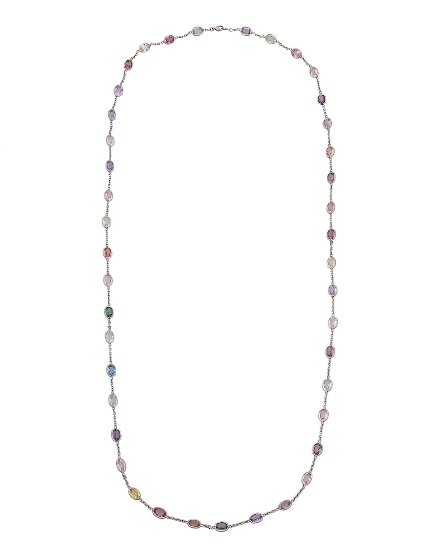 A Platinum and Colored Sapphire Long Chain Of a station design featuring oval blue, green, pink, (1 of 3)