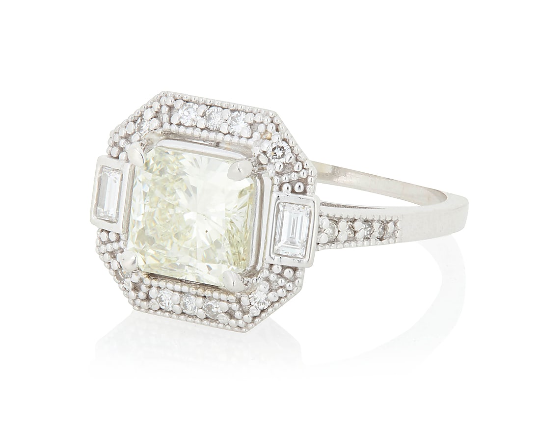 A 14K White Gold and Diamond Ring Centering a princess-cut diamond weighing approximately 2.00 (1 of 4)