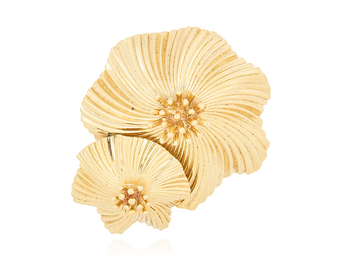Cartier: A 14K Gold Brooch Featuring overlapping swirling burst designs, signed Cartier, c. 1940s: Cartier: A 14K Gold Brooch Featuring overlapping swirling burst designs, signed Cartier, c. 1940s Measures: 1 1/4 x 1 in. 15.4 grams gross
