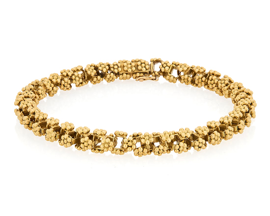 An 18K Gold Bracelet Of an 18k gold floral-pattern motif, composed of articulated floral links, (1 of 4)