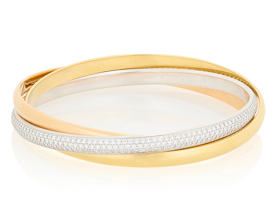 Cartier: An 18K Tri-Color Gold and Diamond 'Trinity' Bracelet Featuring high polish bands of (1 of 4)