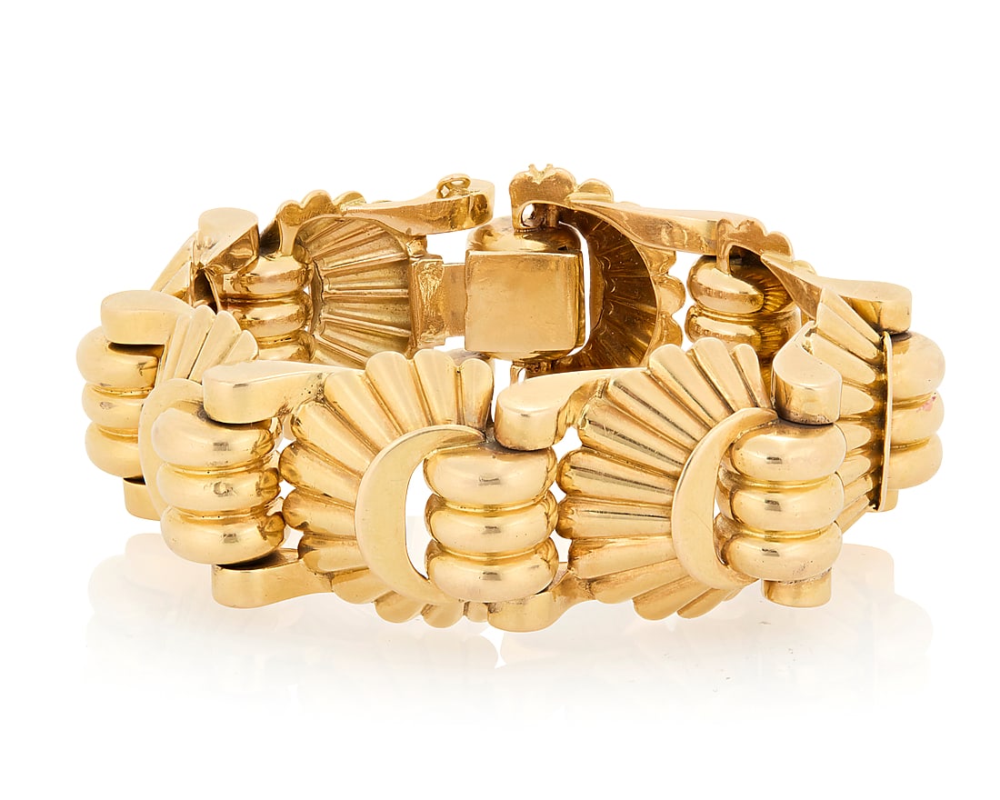 An 18K Gold Bracelet Featuring a geometric nested link design, with French import marks Length: 8 (1 of 3)
