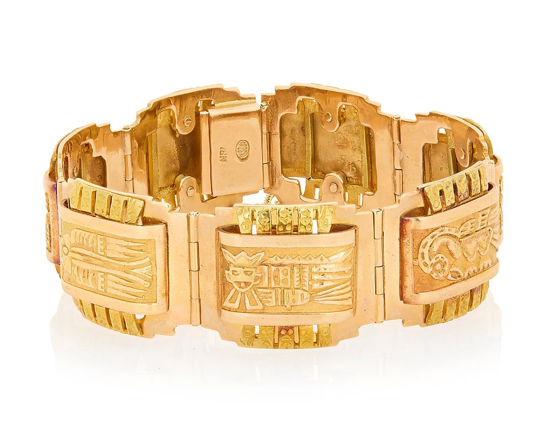 An 18K Bi-Color Gold Bracelet Featuring Aztec motif links of rose gold, accented by textured: An 18K Bi-Color Gold Bracelet Featuring Aztec motif links of rose gold, accented by textured yellow gold Length: 7 in., Width: 7/8 in. 64.8 grams gross