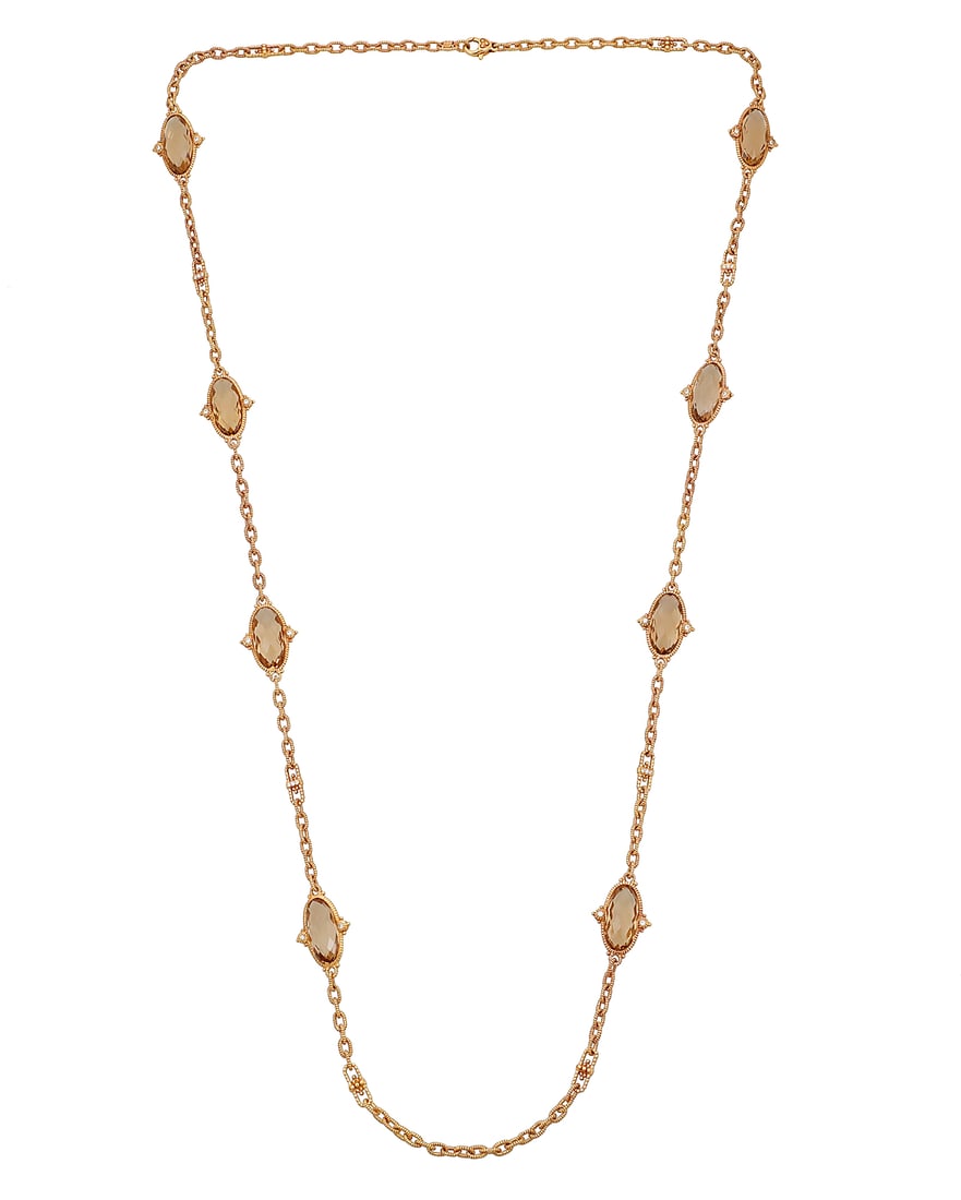 Judith Ripka: An 18K Rose Gold, Smoky Quartz and Diamond Necklace Of a station design featuring: Judith Ripka: An 18K Rose Gold, Smoky Quartz and Diamond Necklace Of a station design featuring eight oval faceted smoky quartz accented by round diamonds, signed JR Length: 34 in. 48.0 grams gross