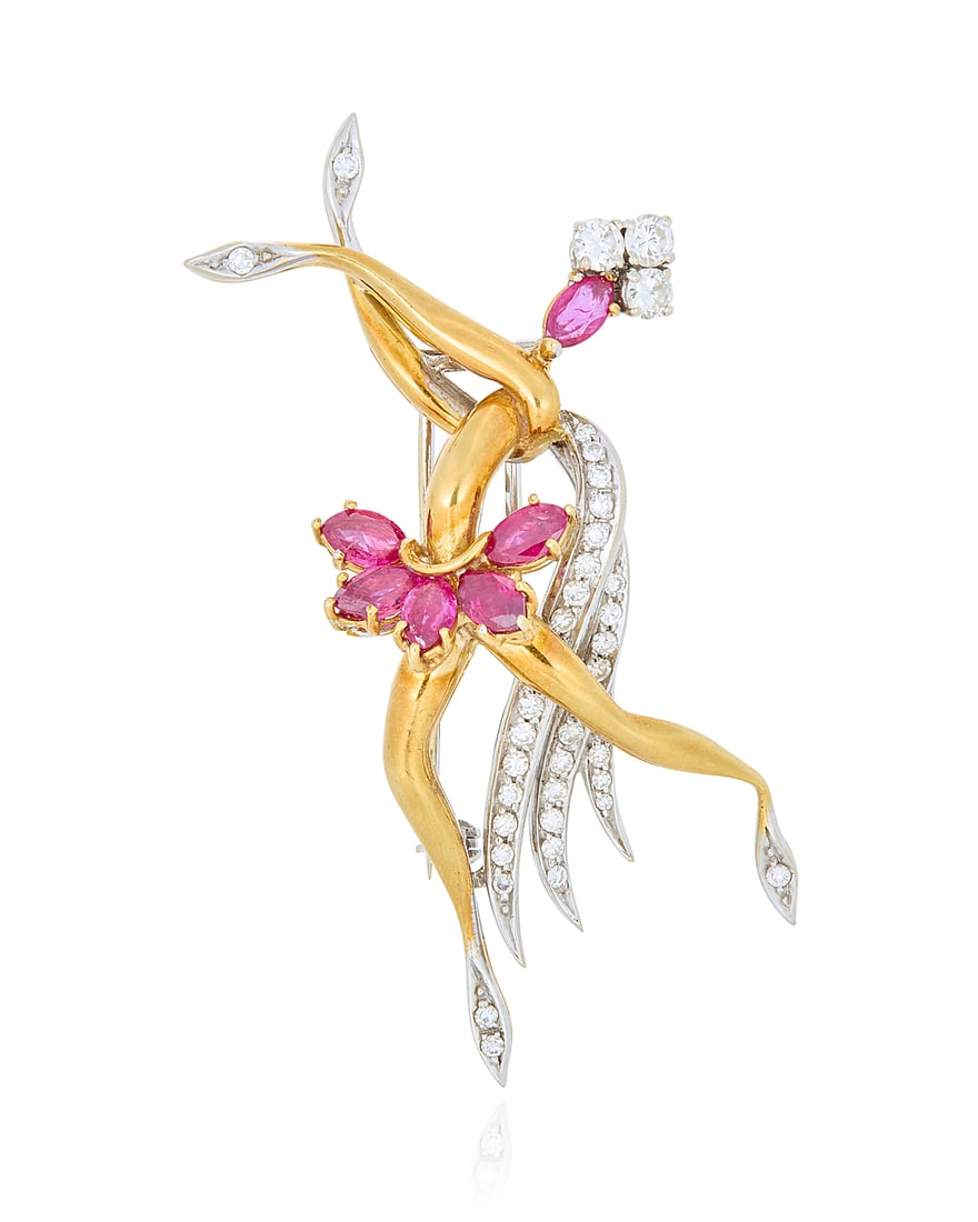 An 18K Bi-Color Gold, Ruby and Diamond Brooch Featuring a ballerina in motion, set with (1 of 3)