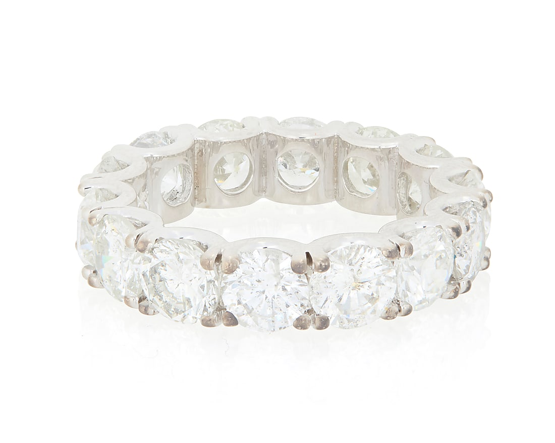 A 14K White Gold and Diamond Eternity Band Featuring fourteen round diamonds weighing 8.53 carats (1 of 3)