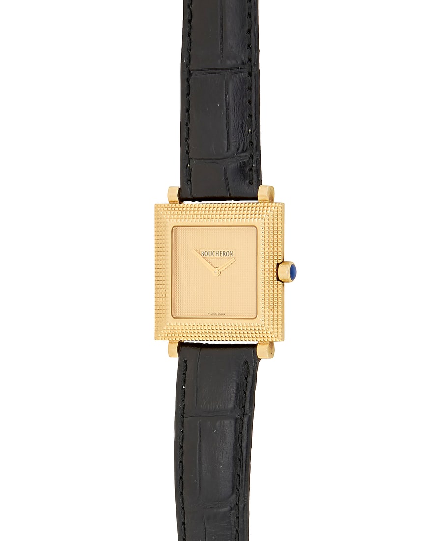 Boucheron: An 18K Gold Carre 'Clous de Paris' Watch Dial: 18.50 mm, square gold dial with no hour: Boucheron: An 18K Gold Carre 'Clous de Paris' Watch Dial: 18.50 mm, square gold dial with no hour markers Case: 28.00 mm Case number: AJ 415022 Closure: black leather strap with and 18k gold buckle cl