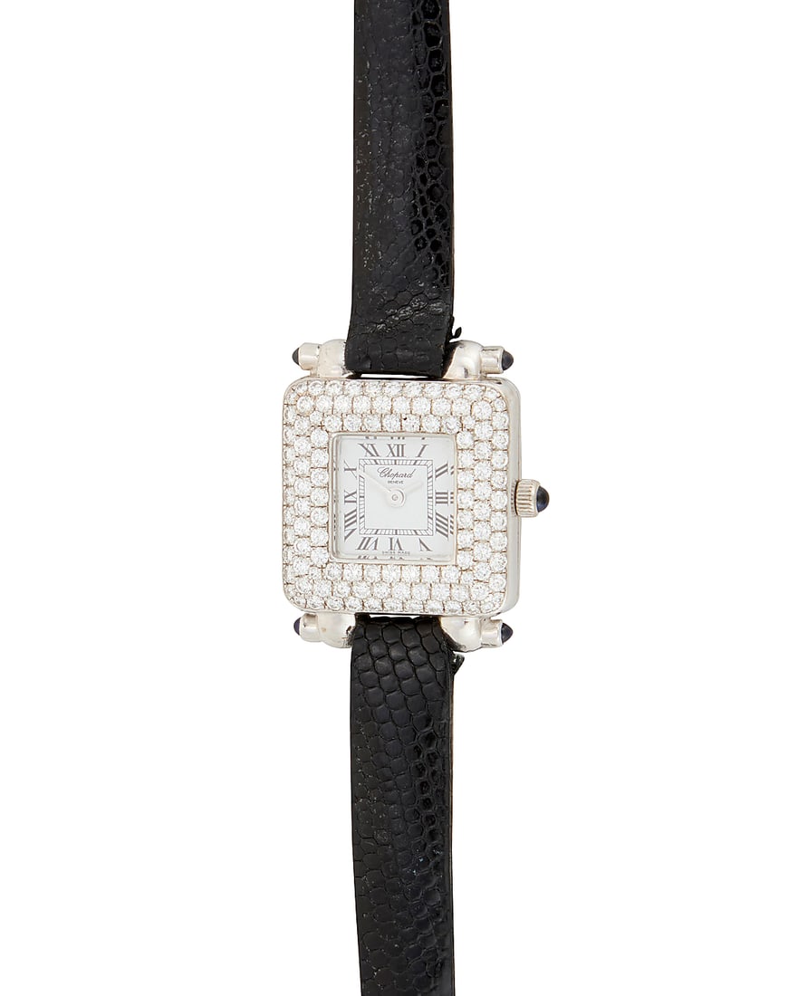 Chopard: An 18K White Gold and Diamond 'Happy Sport' Watch Dial: 11.70 mm, square with Roman: Chopard: An 18K White Gold and Diamond 'Happy Sport' Watch Dial: 11.70 mm, square with Roman numeral hour markers, accented by round diamonds Case: 21.50 mm Number: 976-001, 530482, 419-1 Closure: bla