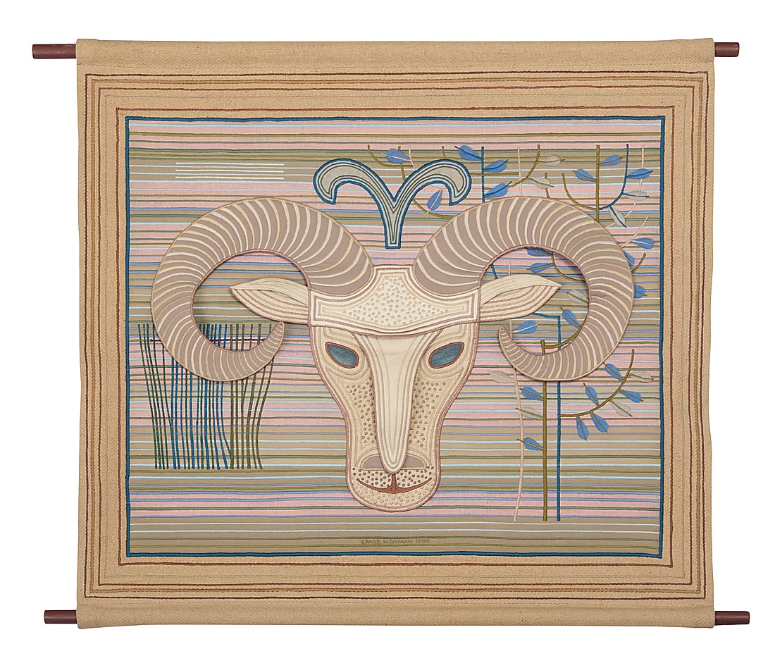 Emile Norman (1918-2009) Ram, 1990 An embroidered and appliquéd textile hanging featuring a: Emile Norman (1918-2009) Ram, 1990 An embroidered and appliquéd textile hanging featuring a dimensional ram's head with movable snout and horns, with hand-embroidered signature and date 29 1/2 x 31 1