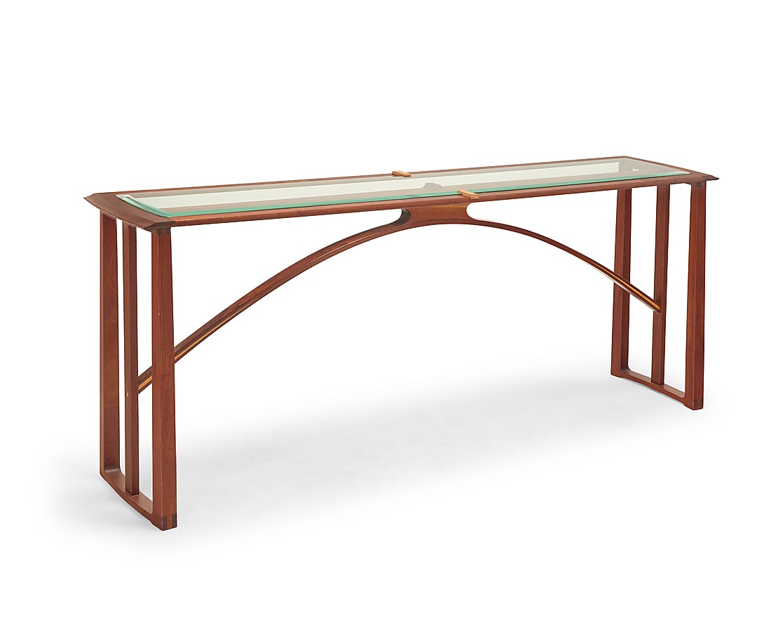 Randy Bader (20th Century) A Contemporary console table, 2006 With inset glass top and arched: Randy Bader (20th Century) A Contemporary console table, 2006 With inset glass top and arched stretcher Etched with signature and date: Randy Bader / woodworking / 3-3-2006 Height 30 1/4 in., width 72