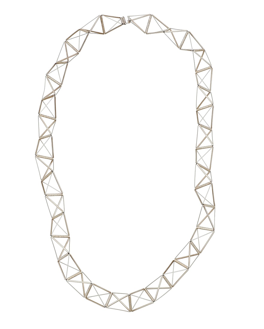 Yoko Takirai (20th Century) A delicate geometric tubular sterling silver necklace, early 21st: Yoko Takirai (20th Century) A delicate geometric tubular sterling silver necklace, early 21st century Stamped to clasp for artist, for sterling and with marks for Florence, Italy 23 1/2 in. x 7/8 in. 
