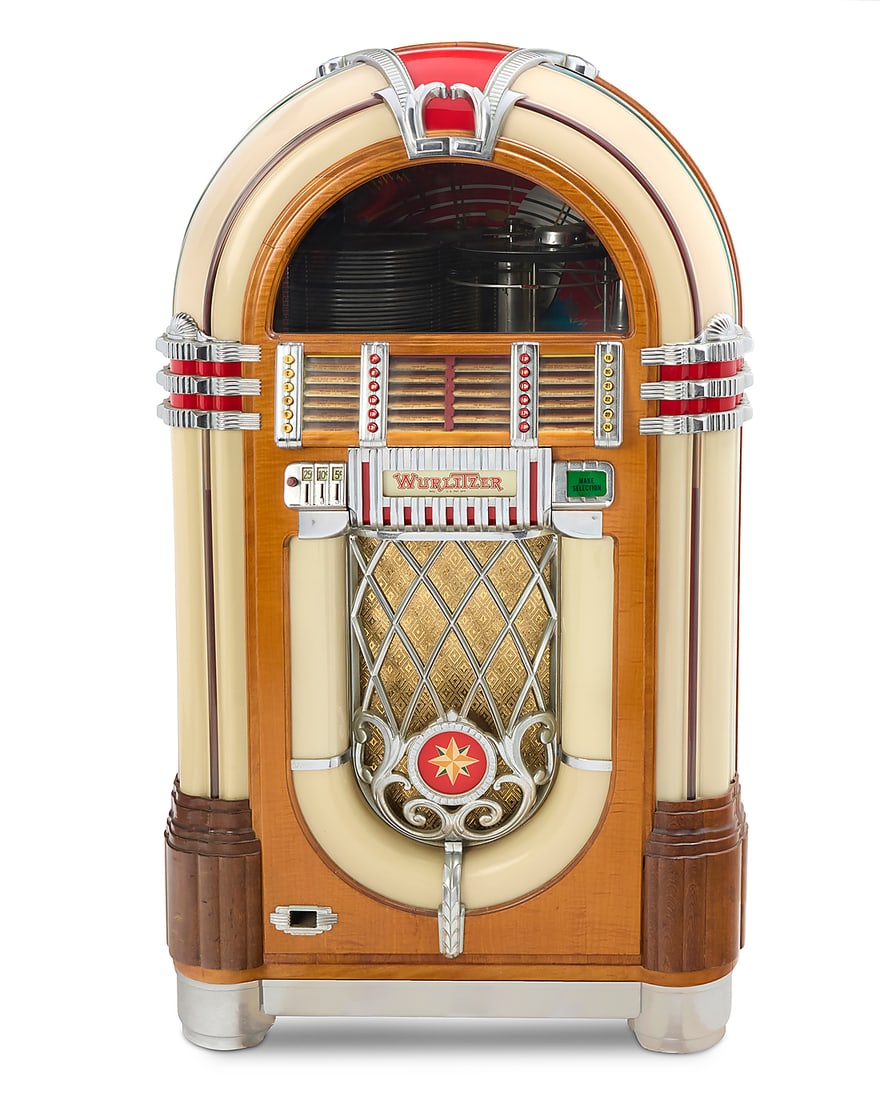 A Wurlitzer jukebox model 1015 'The Bubbler' Designed 1946 by Paul Fuller (1897-1951) With 24: A Wurlitzer jukebox model 1015 'The Bubbler' Designed 1946 by Paul Fuller (1897-1951) With 24 playable selections for 78 rpm vinyl records, featuring upper bubble tubes and opposed color wheel tubes M