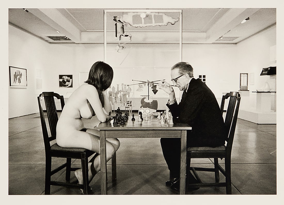 Julian Wasser (b. 1938) "Marcel Duchamp Playing Chess with a Nude [Eve Babitz]," 1963 Gelatin: Julian Wasser (b. 1938) "Marcel Duchamp Playing Chess with a Nude [Eve Babitz]," 1963 Gelatin silver print on paper From the edition of unknown size and date Signed in pencil verso: J Wasser Image: 12