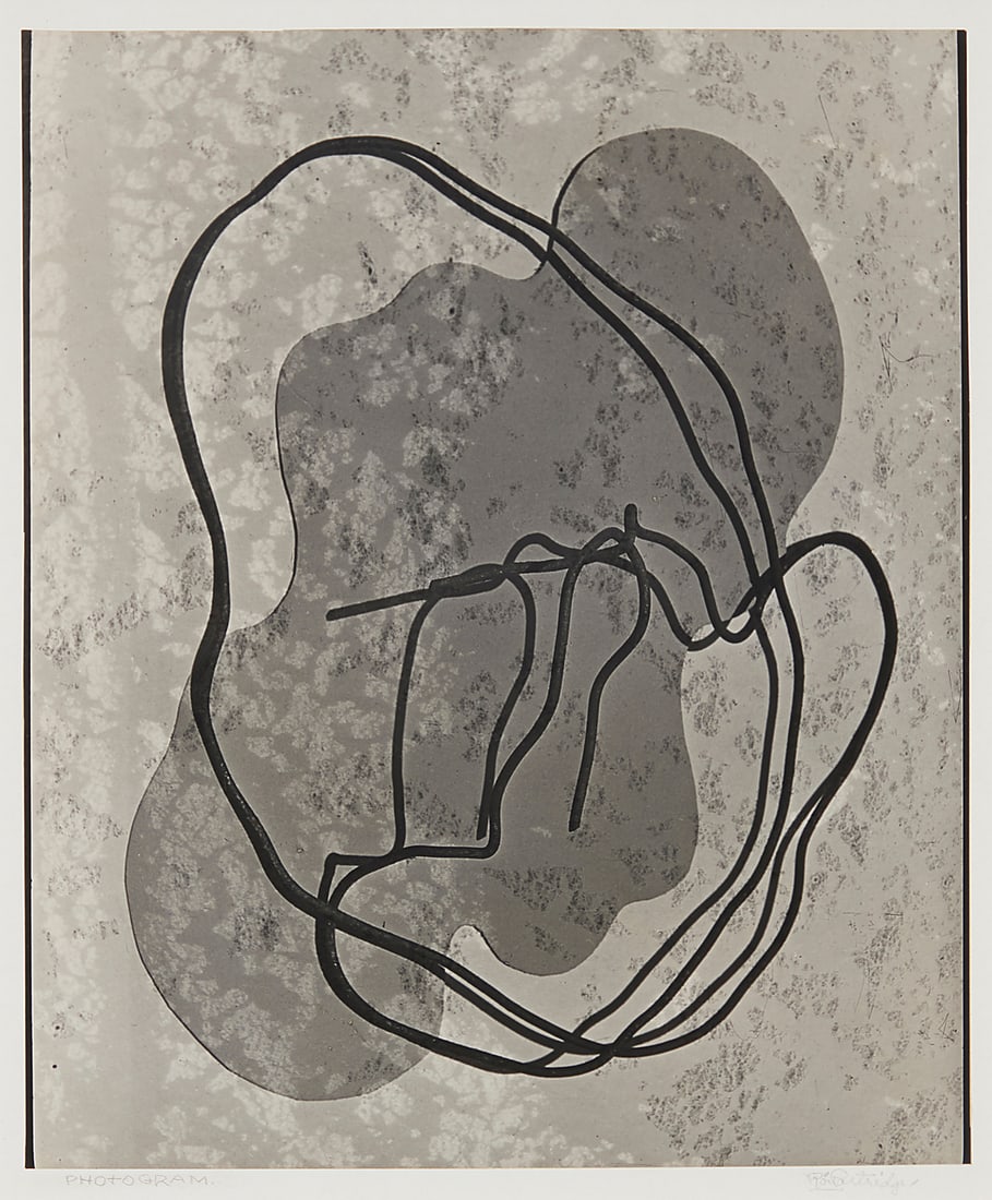 Roi Partridge (1888-1984) "Photogram," c. 1940s Gelatin silver print on paper mounted to slick: Roi Partridge (1888-1984) "Photogram," c. 1940s Gelatin silver print on paper mounted to slick white paperboard From the edition of unknown size Signed and titled on the mount: Roi Partridge / Photogr