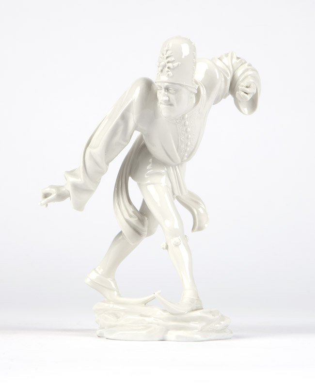An Allach white porcelain Morisken Tanzer figure: ''Burgunder'', model IV of the Moorish Dancer series designed by Richard Forster, 1942, Germany, marked ''Allach'' and ''SS'', depicting a Moorish dancer in Medieval costume on an integral naturalisti