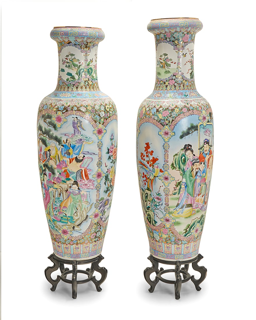 A near pair of Chinese Famille Rose porcelain floor vases: A near pair of Chinese Famille Rose porcelain floor vases Late 20th century Decorated with peonies, bands of meandering motifs, ruyi-form floral medallions, and alternating registers depicting floral 