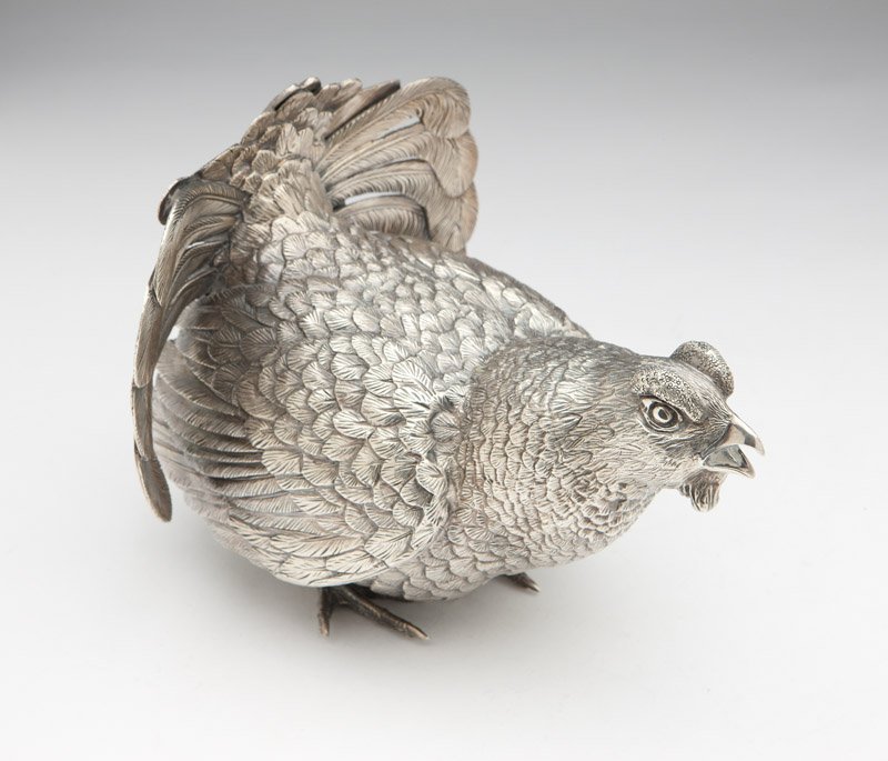 A modern English sterling silver Black Grouse table orn: 2007, London, maker's mark ''TL'' for Timothy Lukes of St. Ives, Cornwall, 7.5'' H x 8'' W x 7'' D, 84.6 oz troy approximately, est: $600/800.