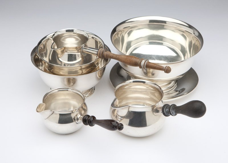 A group of American sterling silver articles: Each 20th century, each marked ''Sterling'', comprising: three wooden-handled saucepans (1 by Fisher, 1 by Timothy Tuttle, 1 by Revere); three Revere style bowls (2 by Shreve & Co, 1 by Gorham); and o