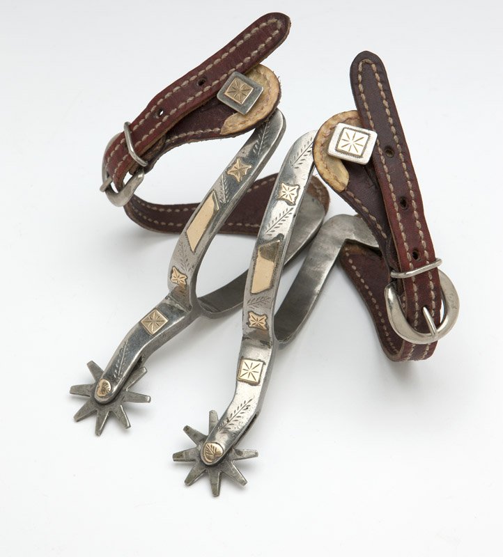 A pair of gold-overlaid German silver Texas spurs: Mid 20th century, 2 pcs, est: $250/350