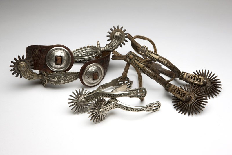 Three pairs of South American spurs: One with silver inlay, one German silver, 6 pcs, est: $350/550