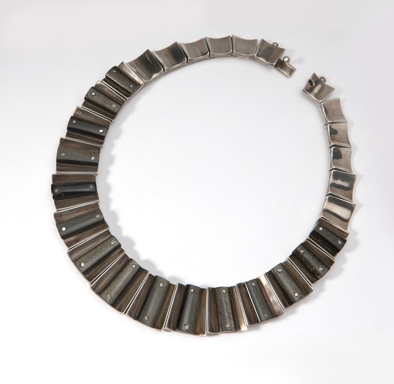 A Martinez sterling silver and obsidian necklace: Stamped ''Piedra y Plata, Martinez'', a sectional collar, 14.5'', est: $400/600 Provenance: Property from a Private Collection, Palm Desert, CA