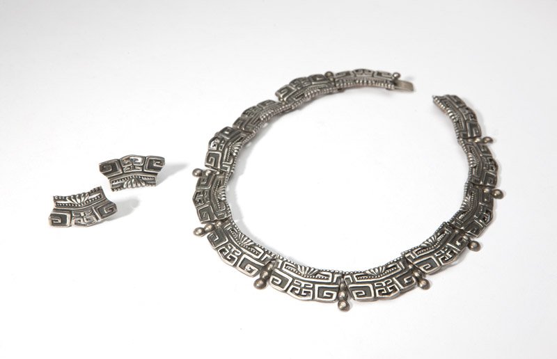 A Margot de Taxco silver necklace and earrings: Stamped ''Margot de Taxco #5280'', a sterling silver sectional necklace with matching scew-back earrings, 14.5'', est: $600/800 Provenance: Property from a Private Collection, Palm Desert, CA