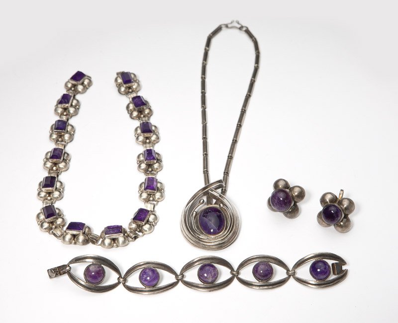 A collection of amethyst and silver Taxco jewelry: Comprising: one pendant-brooch with chain stamped ''Martinez Piedra y Plata''; one short necklace; one bracelet; and one pair of screw-back earrings, 6 pcs, est: $600/800