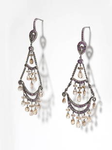 A pair of ruby and diamond earrings, by Mimi So: Oxidized 18K white gold, designed as chandeliers set with 42 briolette-cut diamond beads with light brown color and SI-I clarity and 92 round rubies, 2.1/2", est: $800/1200