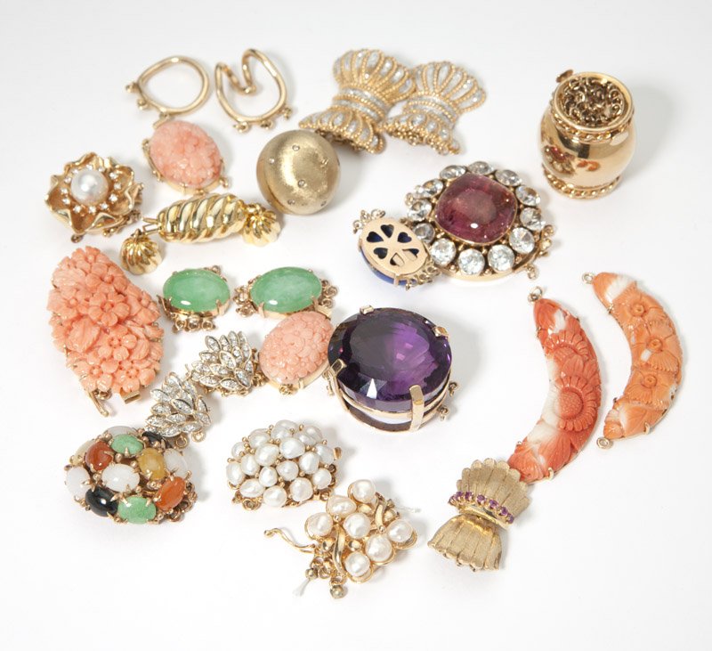 A large group of gold and gem clasp fragments: Featuring 21 complete sets of gold clasps set with diamond accents, gems, carved coral and others together with two carved coral crescent sectionals, 212.7 gms gross, est: $1500/2000