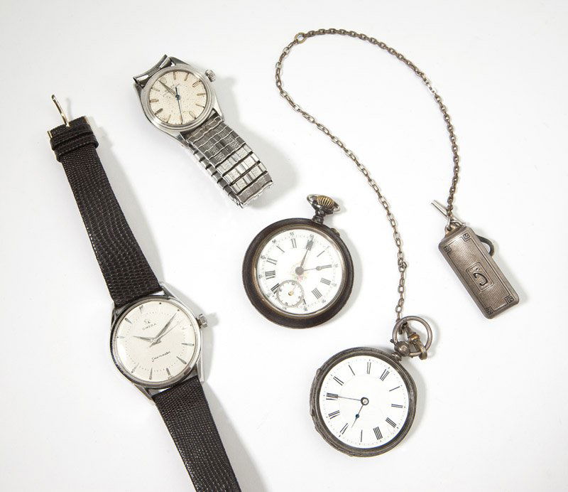 A group of two pocket and two wristwatches: One English silver with metal chain, fob and key wind with crystal dificient, one base metal with floral enamel dial, one stainless steel Omega Seamaster with later added leather band and one Rolex Oy