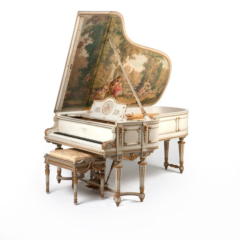 A Steinway & Sons Louis XVI style Model B grand piano: 1901, New York, serial number 99,999, the paneled case raised on fluted tapering circular legs joined by shaped stretchers, grey-painted with gilt-highlighted carved ornament, the exterior of lid poly