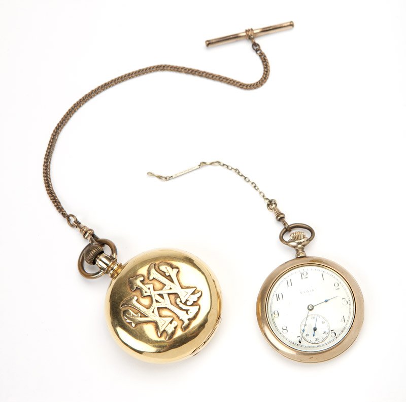 Two American pocket watches: The first: a Hampden hunters case pocket watch, the circular white porcelain dial signed Hampden Watch Co., with black Roman numeral hour markers, black minute track, sub-seconds, attached to a stem w