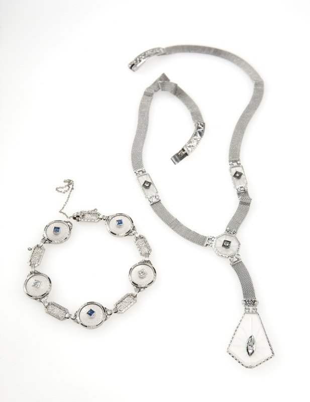 A group of diamond, crystal & white gold jewelry: Comprising: a 14K white gold mesh necklace with frosted crystal sectionals set with diamond centers; and a platinum-topped gold bracelet with frosted crystal sectionals set with alternating diamond an