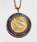 A blue glass and gold coin pendant necklace - 2