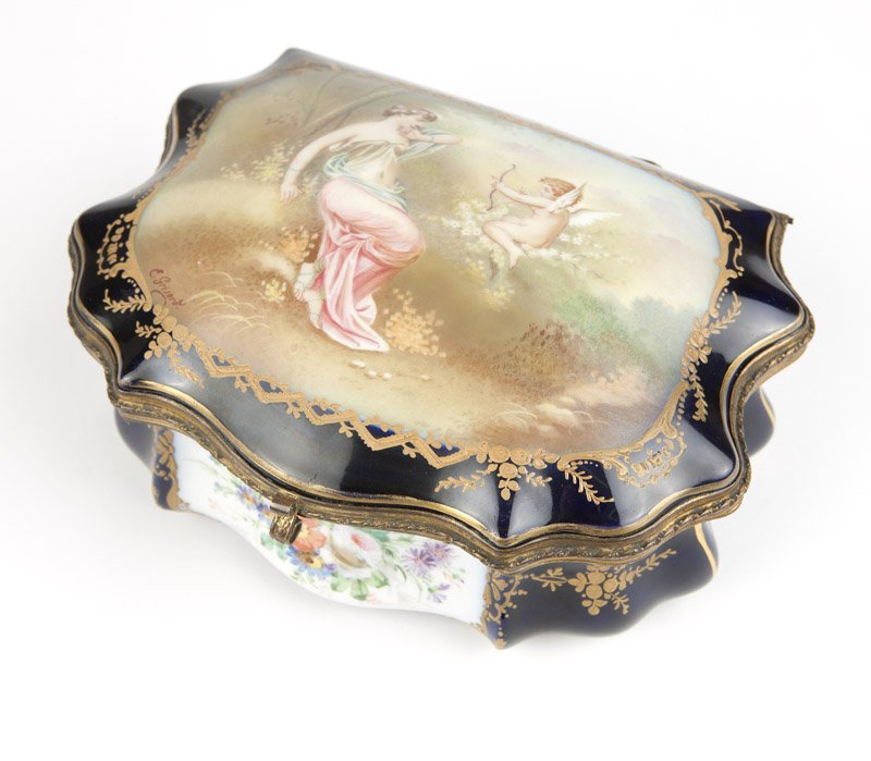 A hand painted Sevres style jewelry box: Late 19th / early 20th century, with spurious overglaze blue intertwined ''L''s centering ''S'' and iron red ''Chateau des Tuileries'' marks, signed to lid ''E. Grisard'', the domed, hinged cover hand