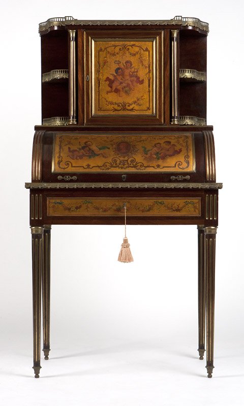 A Louis XVI style Vernis Martin bureau a cylindre: Late 19th century, of mahogany with bronze inlay and gilt metal mounts, the galleried serpentine top of variegated pink, yellow and white marble, set over a cupboard door depicting cherubs, flanked by