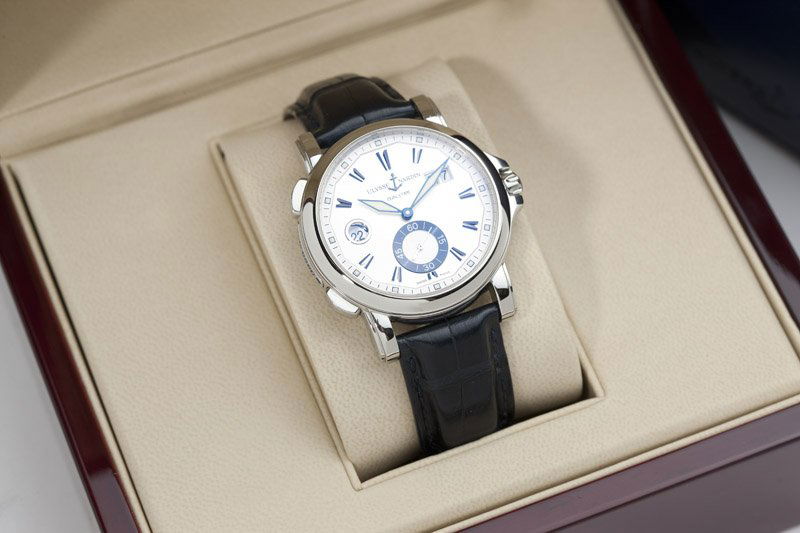 A Ulysse Nardin 'Dual-Time' 'Big-Date' Automatic: Circular silvered step dial with applied hour markers, ''Big Date'' window and 24-hour aperture, luminous hand, sub-seconds dial, 34 jewel Automatic movement, Cal: UNO24 - 991257, movement No: 289242,