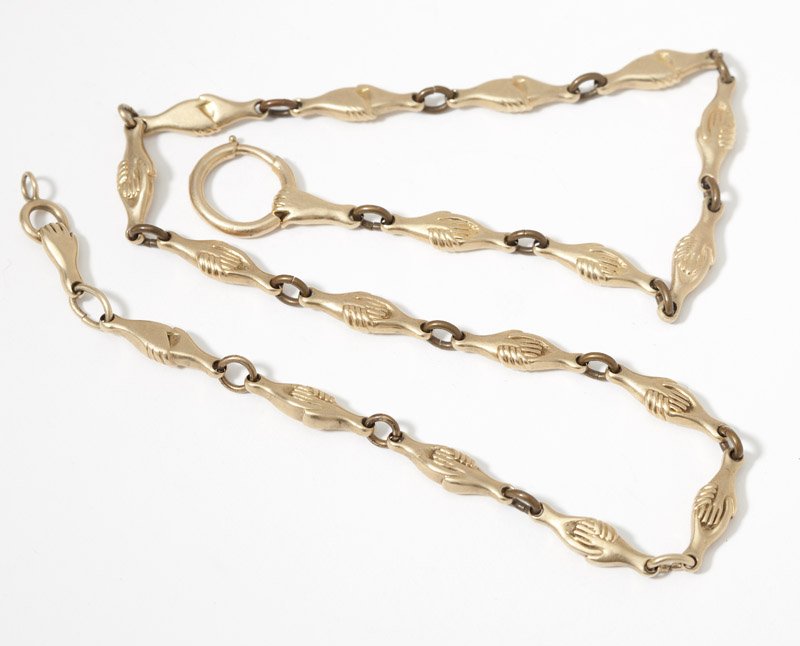 A gold link fob chain of clutching hands: Tested 14K gold sectionals, with gold-filled jump rings, 18 3/4'', 49 gms, est: $700/900
