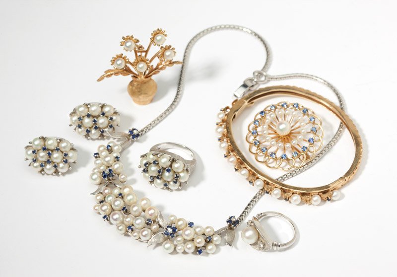 A collection of cultured pearl jewelry: 14K white and yellow gold, including; one bangle, two rings, two brooches, one pair of clip earrings and one necklace with later added chain, 88.6 gms gross, 8 pcs , est: $800/1200