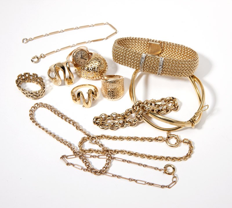 A group of various gold jewelry: 14K gold; four chain link bracelets, four rings, one watch ring, one covered dial mesh bracelet wristwatch, dial signed ''Alsta''; one 10K gold chain link bracelet; one 18K gold bangle and one ring, 1
