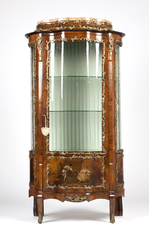 A Louis XV style gilt bronze-mounted vitrine cabinet: Late 19th century, central Vernis Martin panel faintly signed ''H. M?ss?'', the shaped demi-lune peach marble-topped domed cornice surmounting the serpentine-outline walnut-veneered glazed-panel cabin