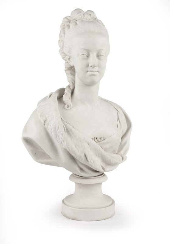 A Sevres biscuit porcelain bust of Marie Antoinette: 1860-1899, signed to verso ''Pajou'' after the model by Augustin Pajou (1730-1809 French), incised ''Sevres'' within a lozenge, further incised ''ER.02.7'' with a backwards-facing E for decorator Emil