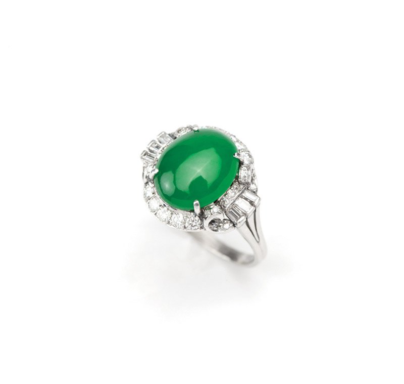 A jadeite jade, diamond and platinum ring: Platinum mount, centering an oval jadeite cabochon accompanied by Mason-Kay report dated July 9, 2014 stating: 4.12 cts Natural Jadeite Jade, no dye or polymer detected, Type A jade, measuring 10.51 x