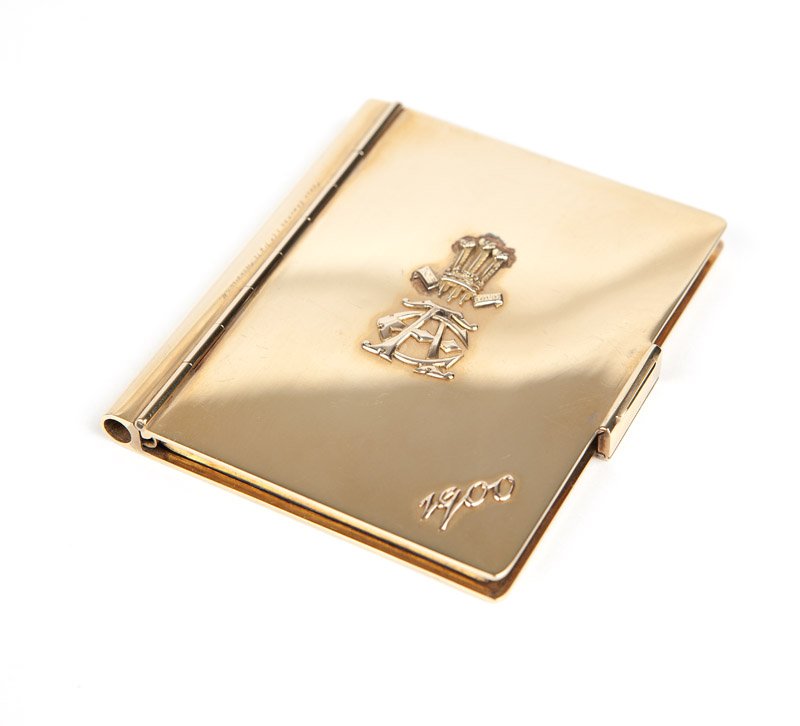 A gold case William Frederick Williams London: 15K gold, London assay mark, inscribed ''Presented By Queen Alexandra to Richard George Penn Earl Howe in Remembrance of King Edward VIII May 1910'' with a gold score book, hallmarked 1899 London, 15k