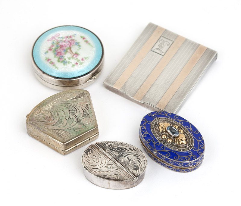 A group of four pill boxes and one match case: Three sterling silver pill boxes, one with floral enamel lid; one sterling silver with gold inlay match case; and one metal, blue enemel and gem-set lid box, 5 pcs, est: $400/600 Provenance: Property 