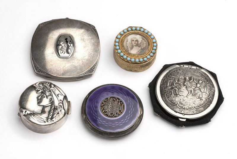 A collection of lady's compacts: A group of five lady's compacts and a coin purse, the first; sterling silver with purple guilloche design and central etched floral motif; the second: sterling silver with a female face to lid; the th