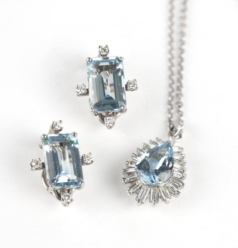 A collection of aquamarine jewelry: 14K white gold and diamond accent earclips and a 10K white gold and rectangular baguette-cut diamond pendant on 14K white gold chain, est: $400/600 Provenance: Property from a Pasadena Collector