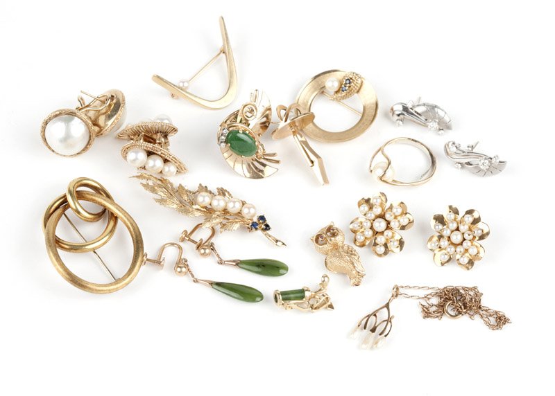 A collection of jade and gold jewelry: Comprising of six pairs of 14K white and yellow gold earrings set with cultured and mabe pearl, jade and diamond, four brooches; two pendants (one with chain), one ring, a single cufflink and one 18K 