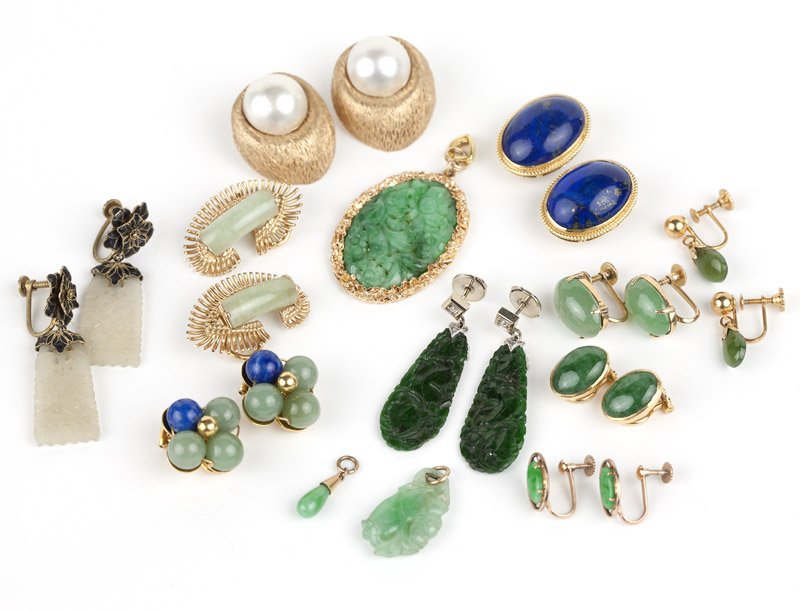 A group of hard stone, jade and gold earrings: Of 18K, 14K and 10K golds, a group of eight screw-back earrings and earclips, three pendants, and two pairs of costume screw-back earrings, 23 pcs, est: $600/800 Provenance: Property from a Pasadena C