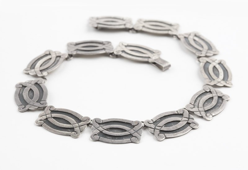 A silver sectional necklace: Stamped Tlaquepaque, Mexico, FCS, Plata 925, a silver flat sectional necklace, hook closure, 15'', 60 gms, est: $100/200 Provenance: Property from a Southern California Collector